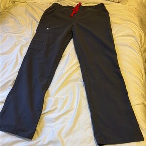 Dark grey Figs scrub pants in sz small.  Red drawstring.